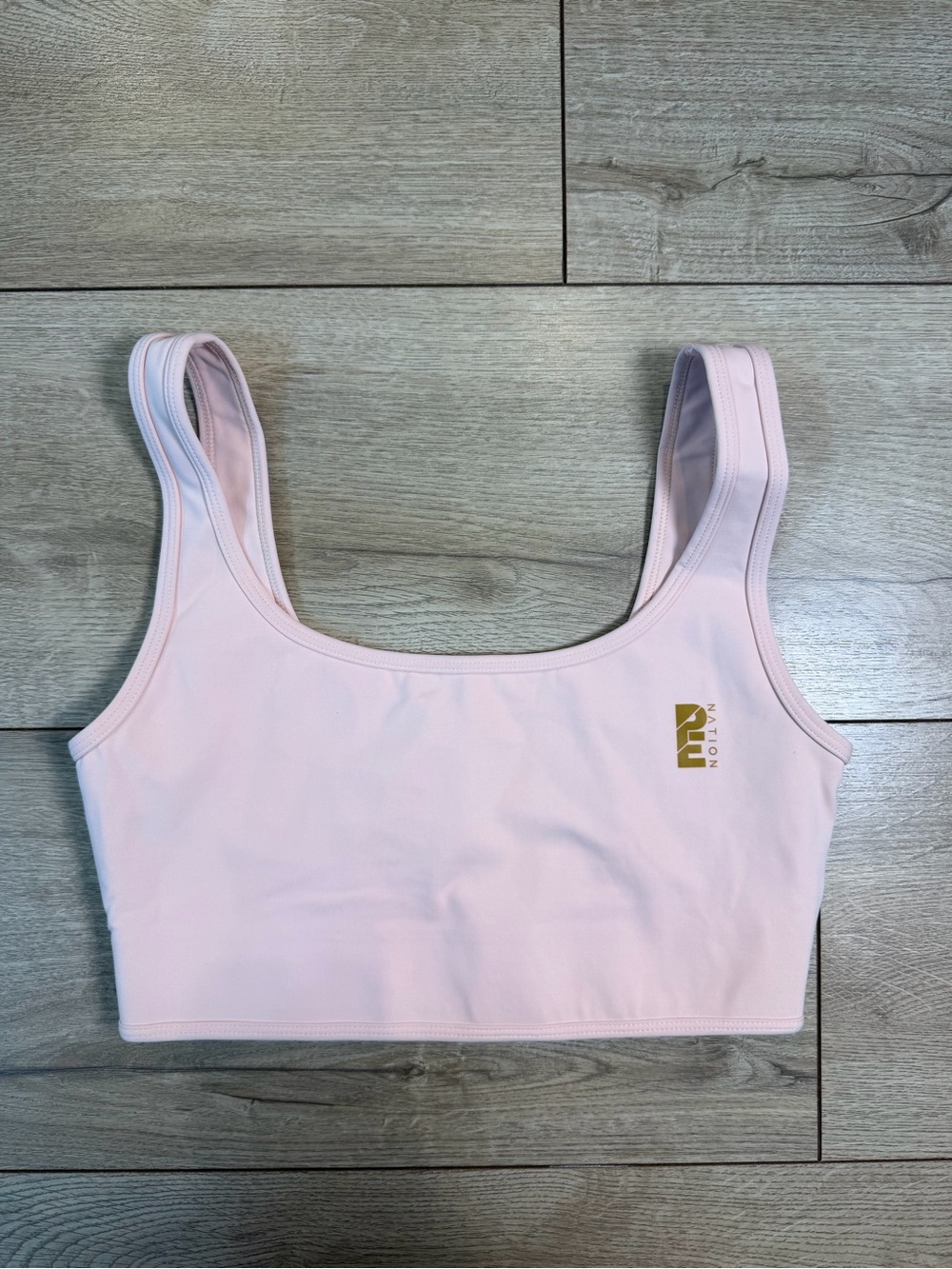 P.E Nation Pale Pink /Peach Scoop Sports Bra with Gold Logo